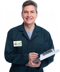 Man in J & C Green Solutions work uniform